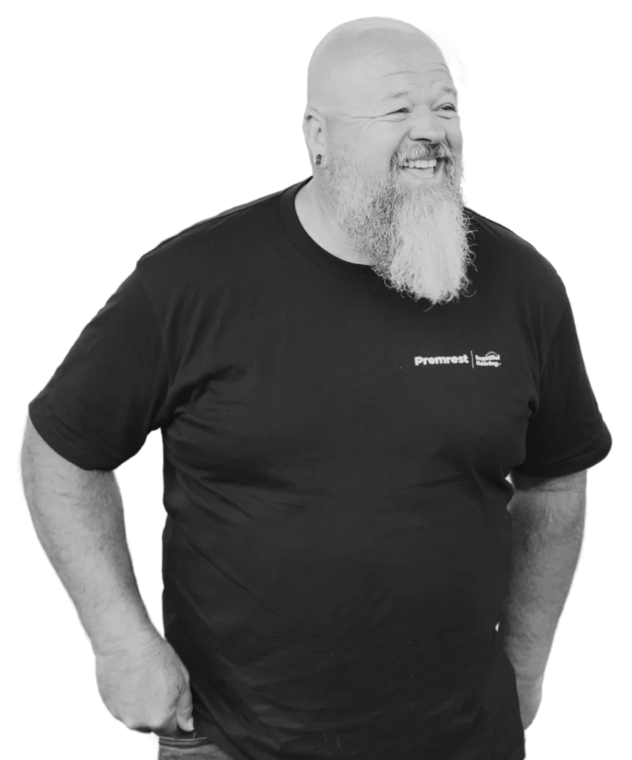 Colin, Director of Premrest, smiling in his work shirt